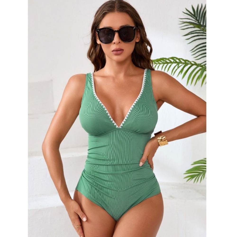 Charmo women’s ribbed one piece bathing suit. V neck. Cutout back.